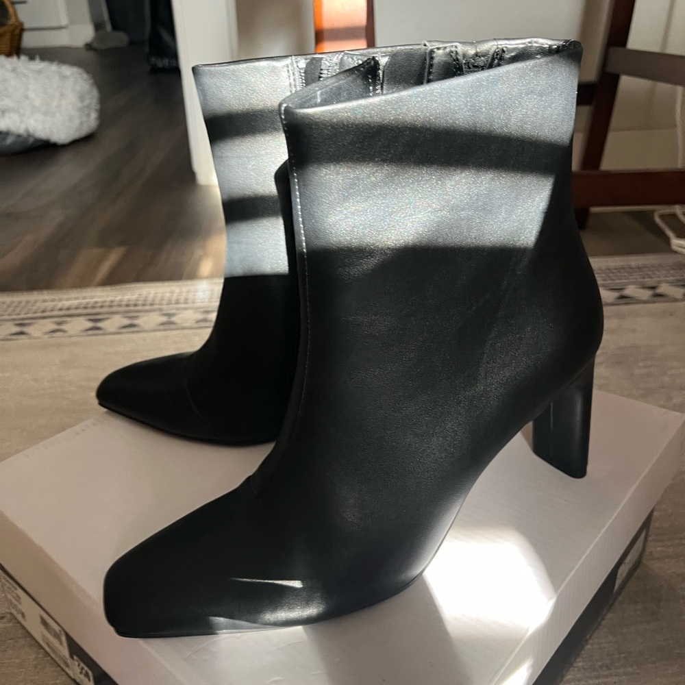 Alfani black boots. Super comfortable. Never worn. 2 in heel